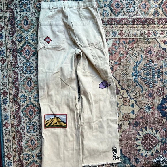 PacSun Wyoming & Western Graphic wide leg cream carpenter denim pants, size 23 - Picture 6 of 8